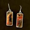 74_acrylic paint "skin" and resin, sterling silver earwire. 1"  $35