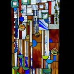 Santa Fe Saguaro Commission window featuring hand rolled and hand blown glass, Fremont, Bullseye, Spectrum baroque, etched bevels and more